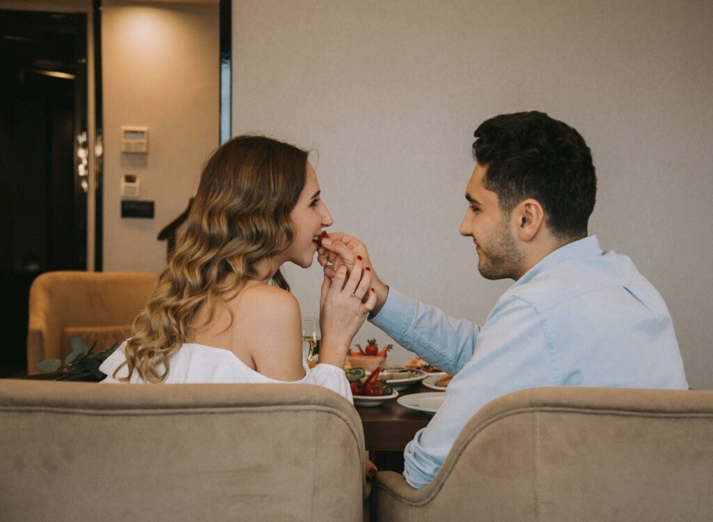 A Couple Sitting at the Table