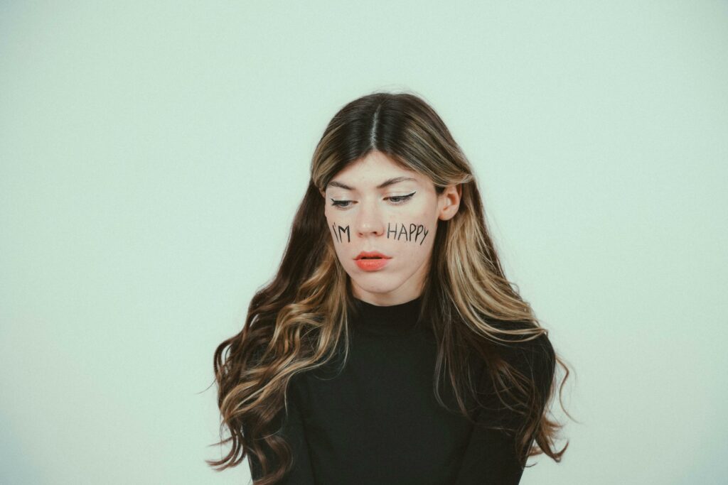 Contemplative Portrait with 'I'm Happy' Message