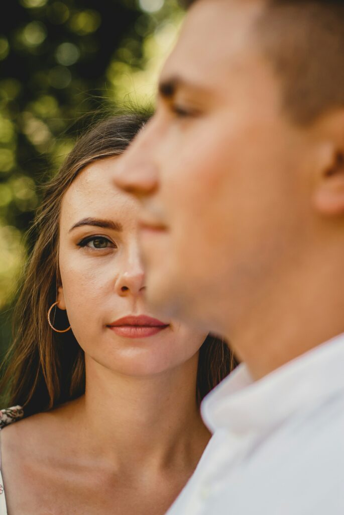 woman in white shirt with silver earrings